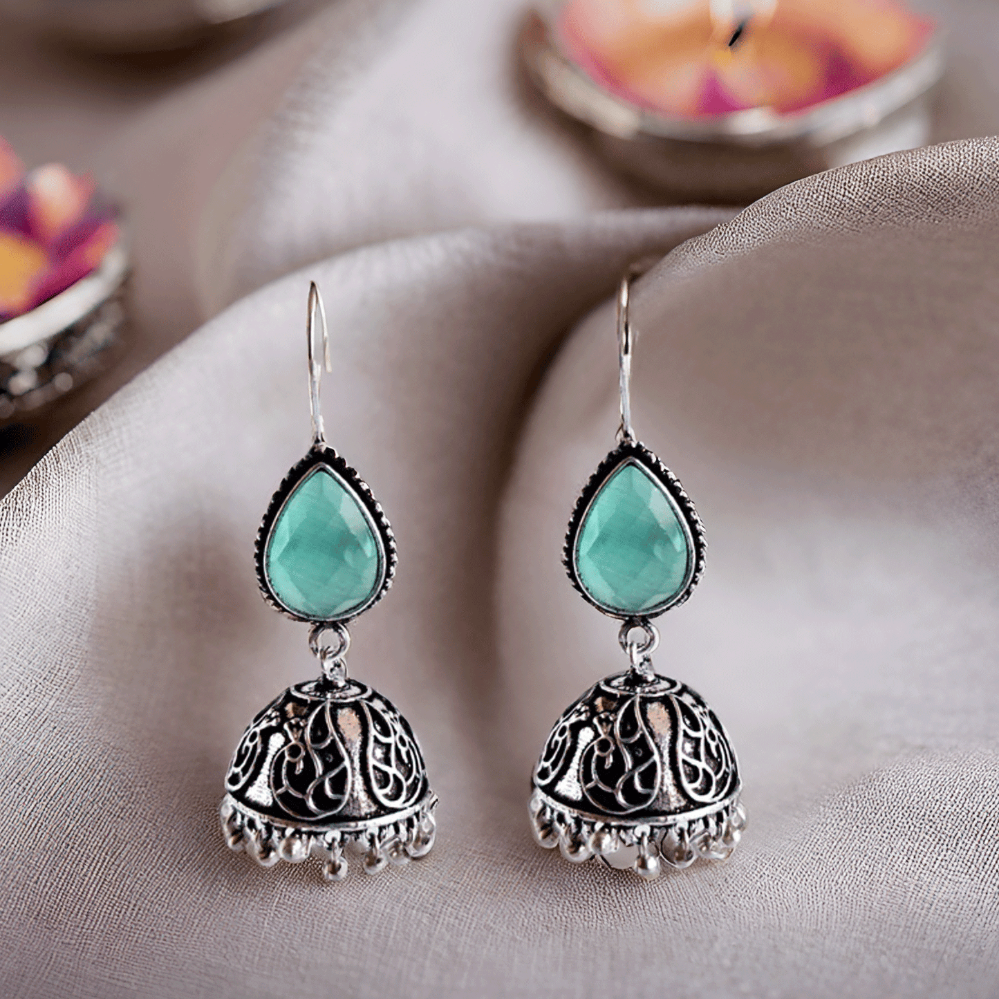 Mint Green Stone Oxidised Silver Jhumka Earrings