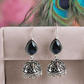 Mint Green Stone Oxidised Silver Jhumka Earrings