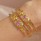 Combo Set of 2 Traditional Gold Plated Bangles â€“ Floral Ruby Stone Design
